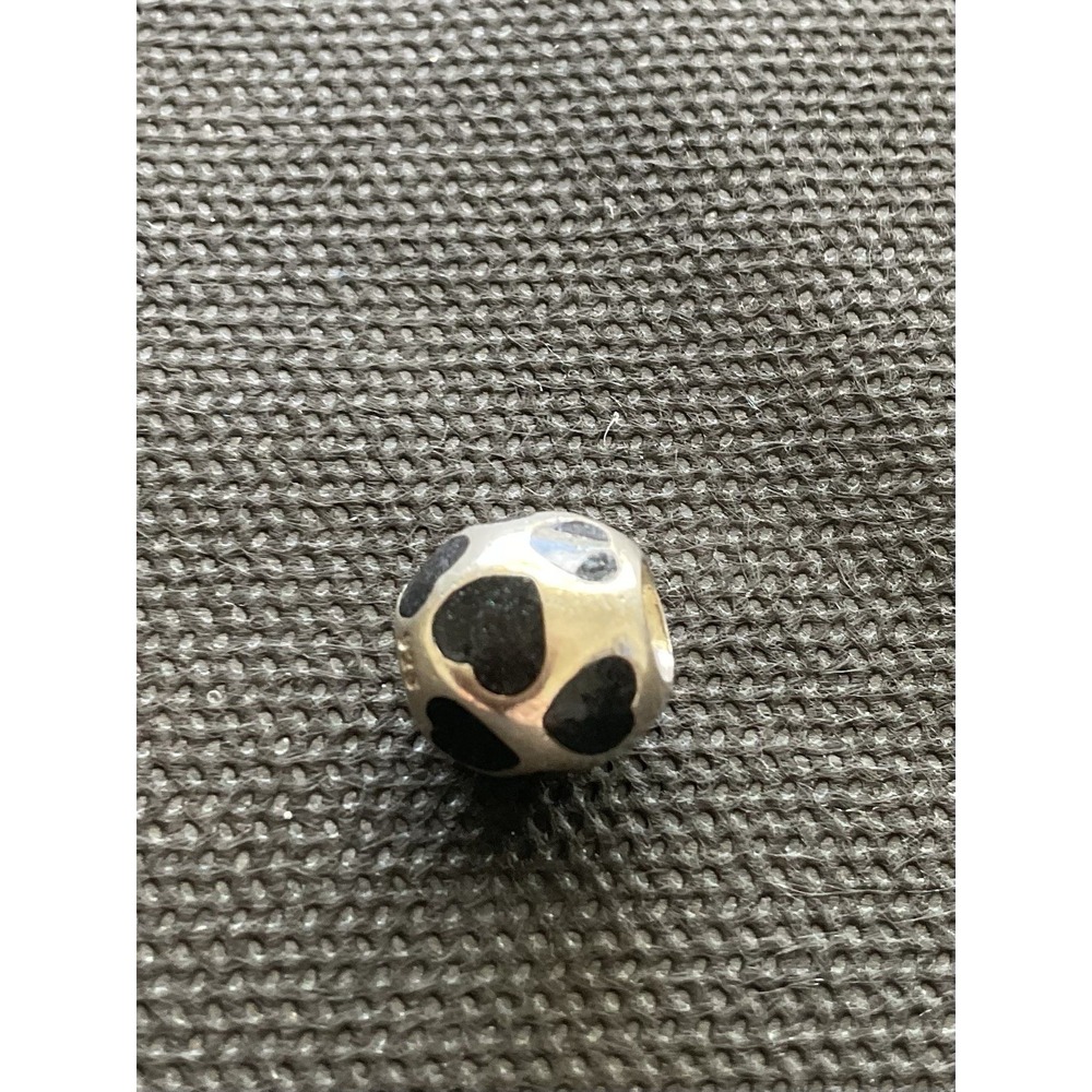 retired Pandora sterling silver "Love You" bead featuring black enamel hearts